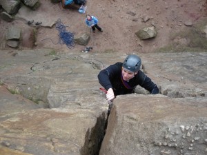 Holding on securely whilst placing a cam