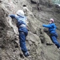 picture of student learning to climb.